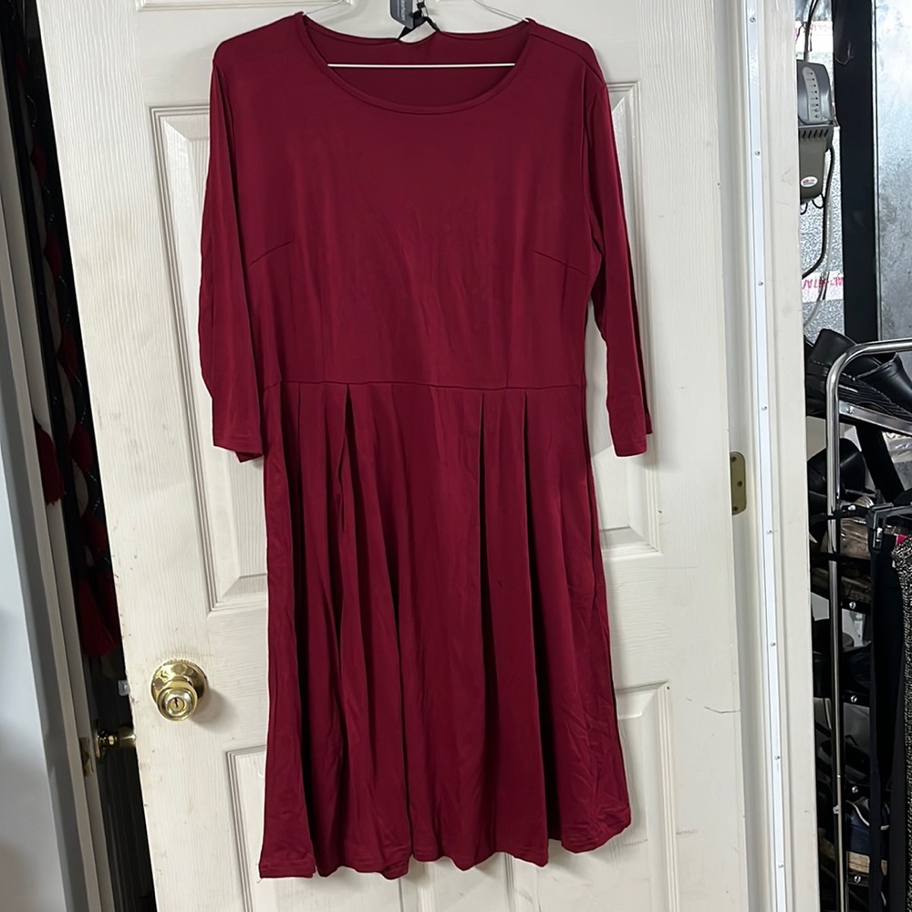Red wine colored dress size XXL. Would be very nice for a Christmas dress. NWT